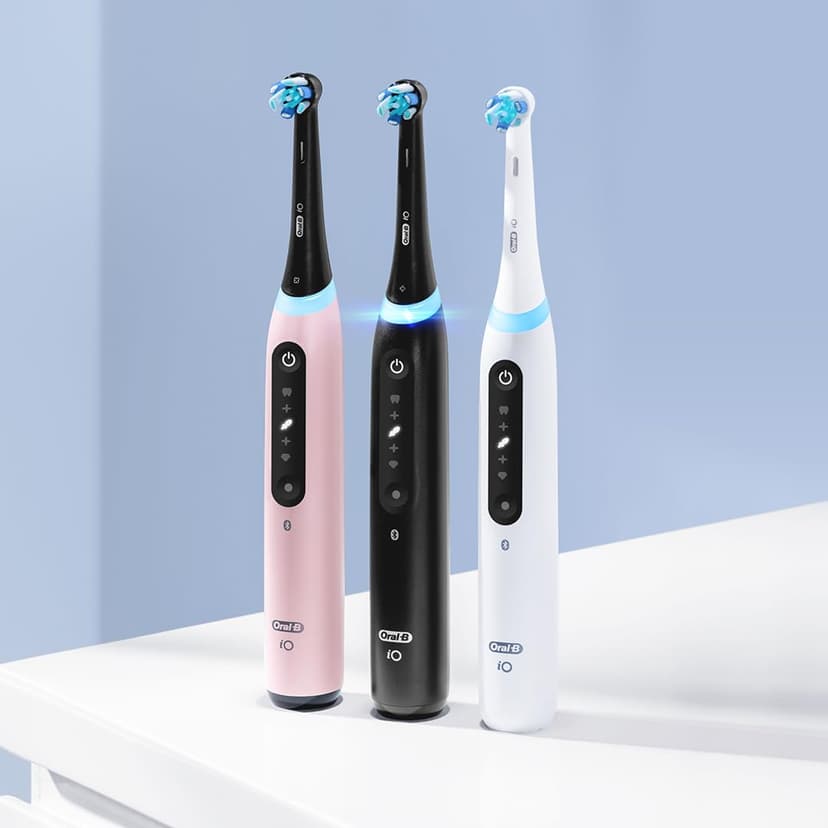 Oral-B iO Series 5 Rechargeable Electric Toothbrush with Visible Pressure Sensor to Protect Gums, 2 Minute Timer, 5 Cleaning Settings, 1 Replacement Toothbrush Heads, and Travel Case, Black