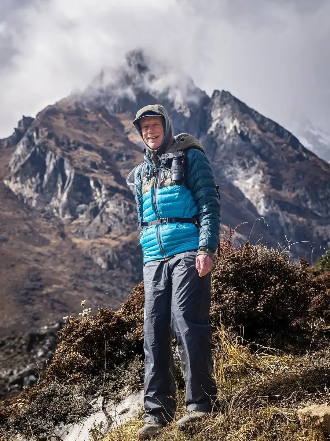 A hiker in a blue jacket