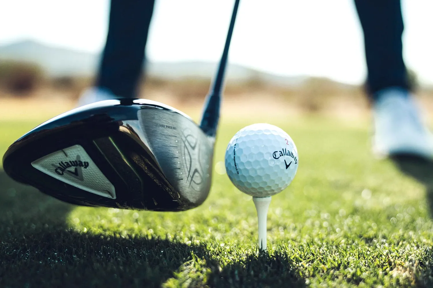A man play golf using callaway golf club