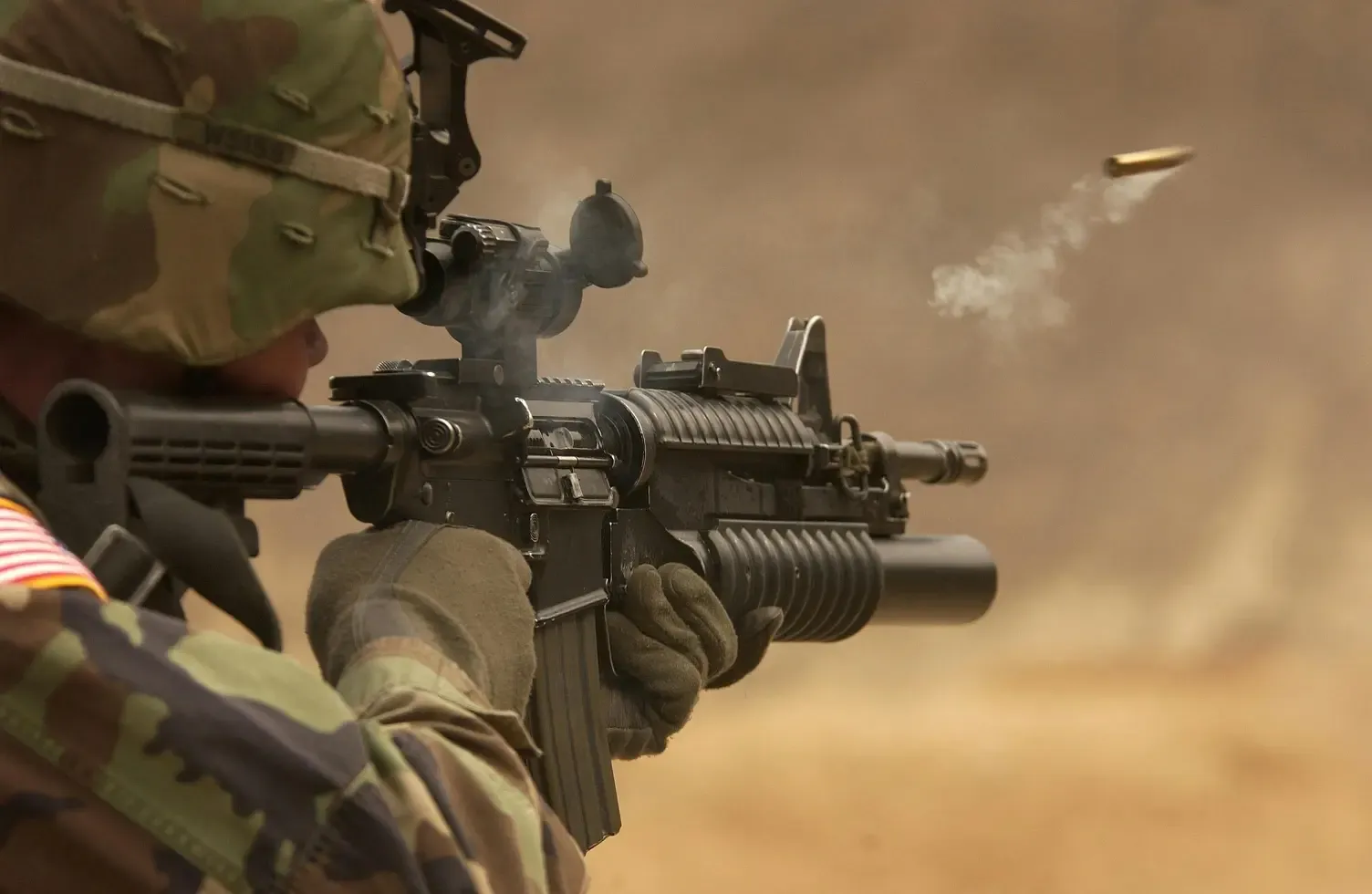 A soldier use gun