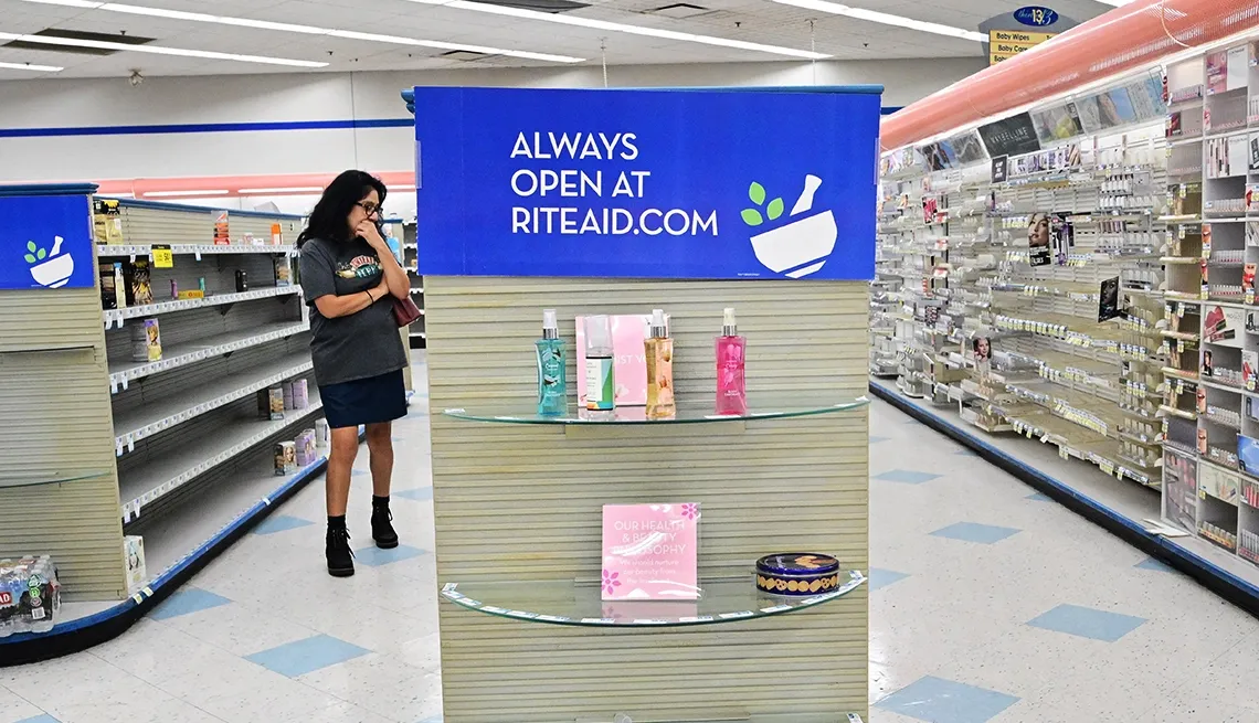 A nearly empty Rite Aid store with bare shelves and a sign directing shoppers to RiteAid.com. (Image: Getty Images) A nearly empty Rite Aid store with bare shelves and a sign directing shoppers to RiteAid.com.
