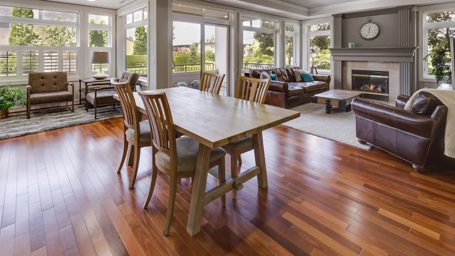 Bright modern living room with clean hardwood floors and minimal furniture, emphasizing cleanliness and home maintenance