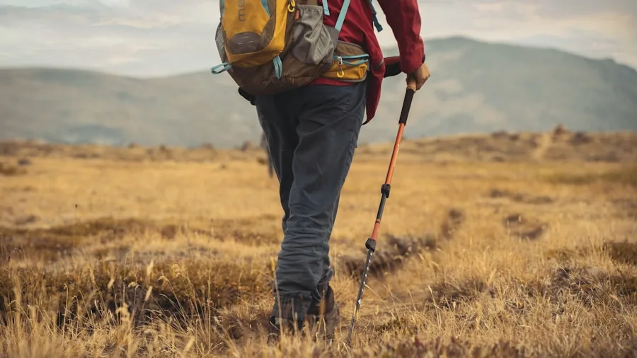 Close-up of a hiker's boots on a rocky mountain trail during a long-distance hiking journey