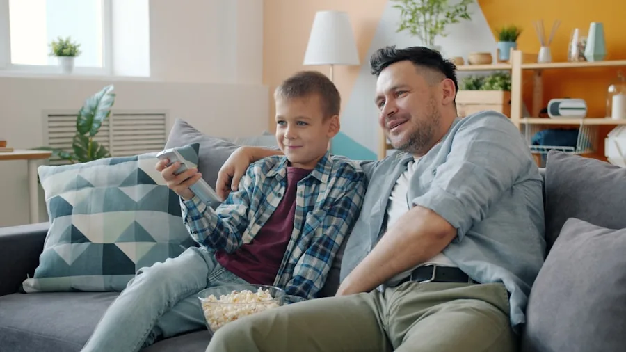 Family gathered in living room watching TV together in comfortable home setting