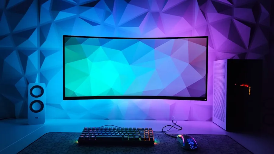 Gamer sitting at desk with gaming monitor and keyboard in home office environment