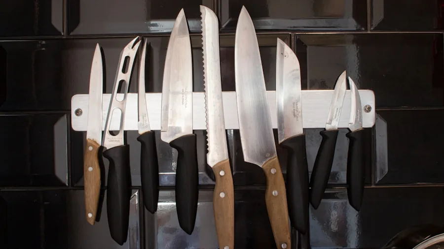 Home cook examining different kitchen knives while planning meal preparation in modern kitchen