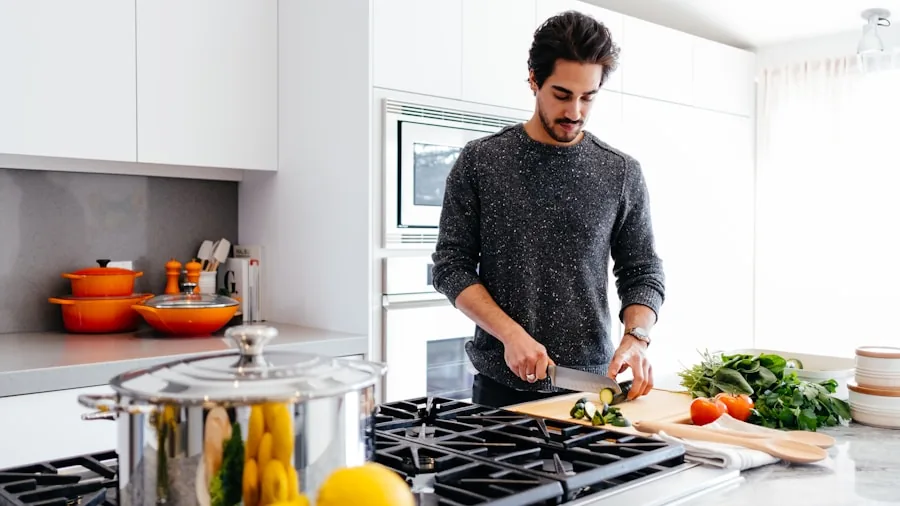 Home cook monitoring food temperature while preparing a meal in a bright kitchen