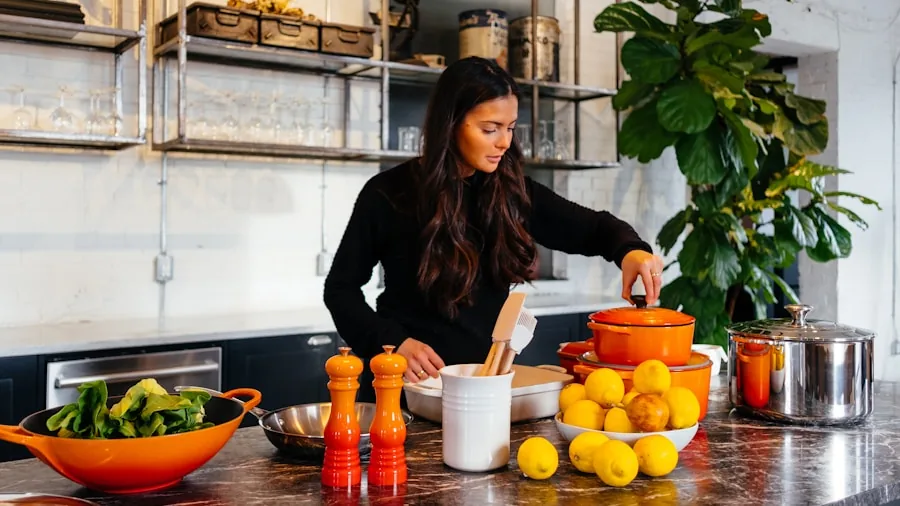 Home cook preparing fresh ingredients in a modern kitchen with stainless steel cookware