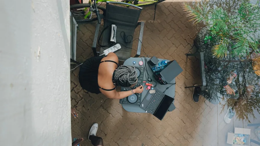 Homeowner maintaining outdoor cleaning equipment on residential deck during maintenance work