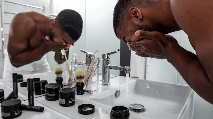 Man grooming and shaving in bathroom mirror during morning routine