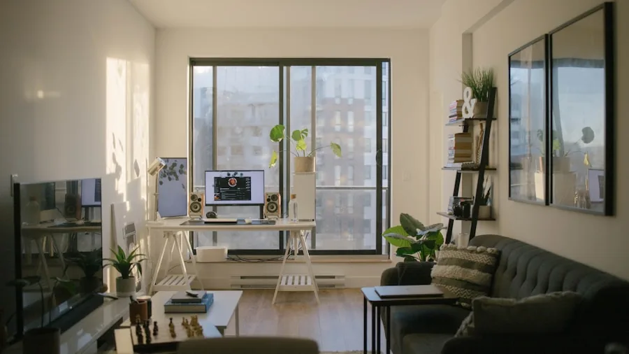 Minimalist apartment living room with clean hardwood floors and natural light from windows