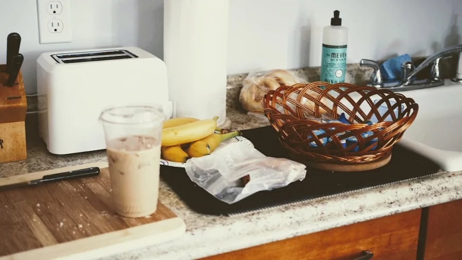 Minimalist kitchen counter with compact appliances and fresh breakfast setup in natural light