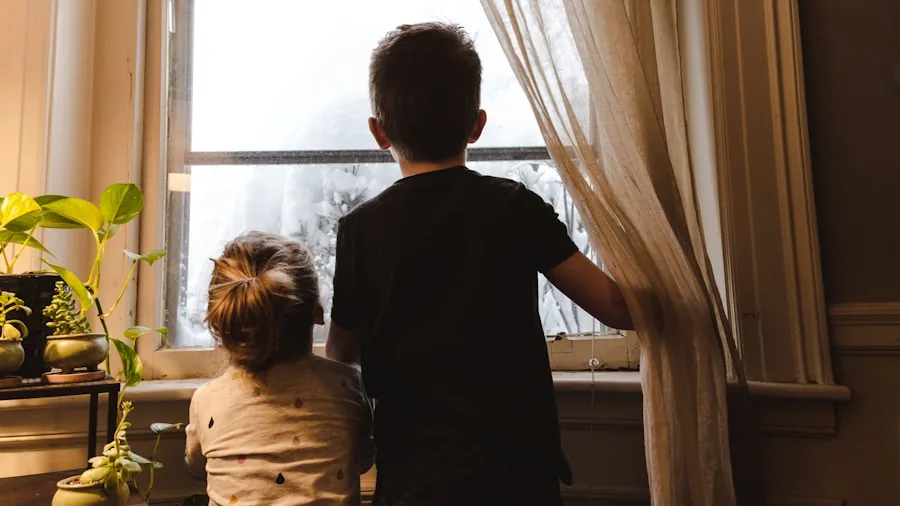 Parent checking on sleeping child in bedroom at night, emphasizing home safety and peace of mind