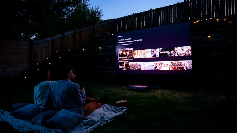 People watching outdoor movie projection in evening light with natural ambient conditions