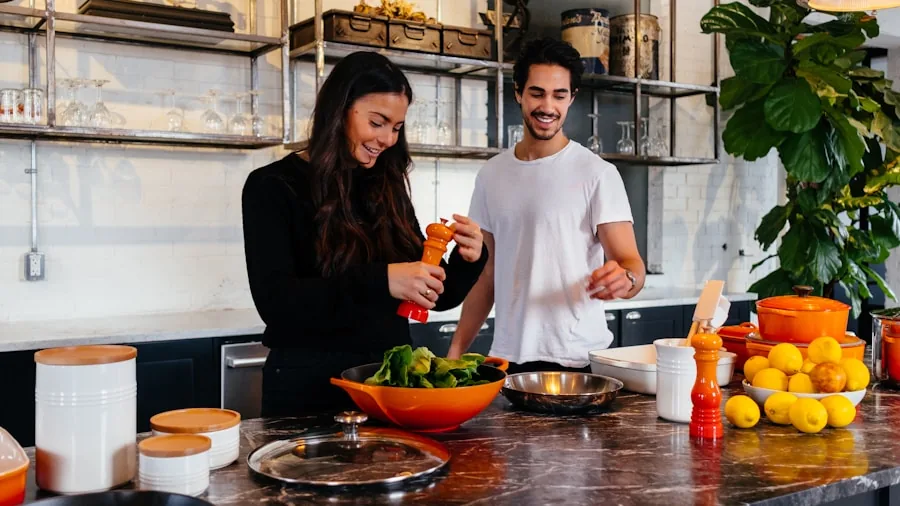 Person cooking in a modest home kitchen with basic cookware and ingredients on the stovetop