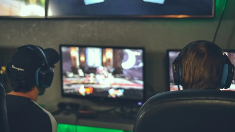 Person enjoying a gaming session on a television setup in a living room environment