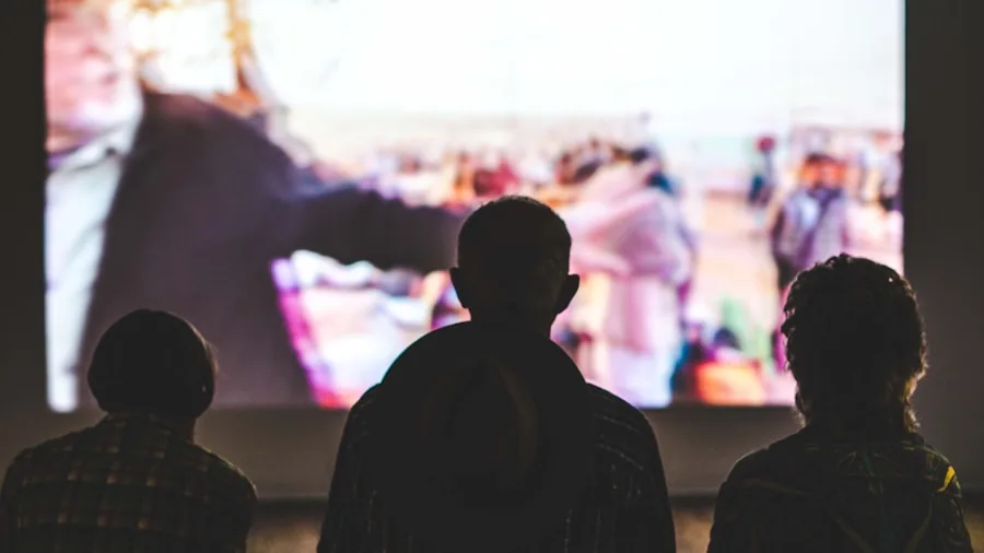 Person enjoying vibrant HDR display on television in living room with enhanced color and brightness