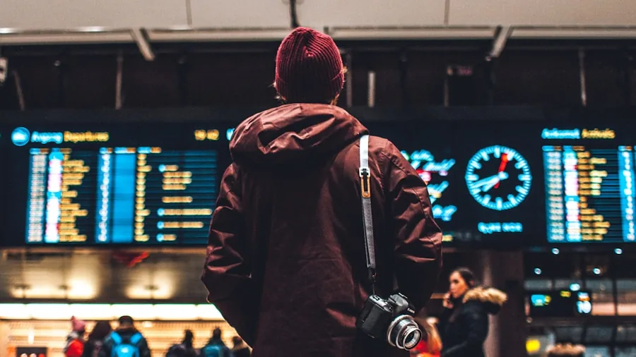 Person measuring carry-on bag dimensions at airport counter before flight departure