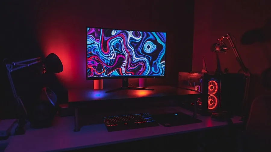 Person sitting at desk with computer setup, relaxed gaming posture in home environment