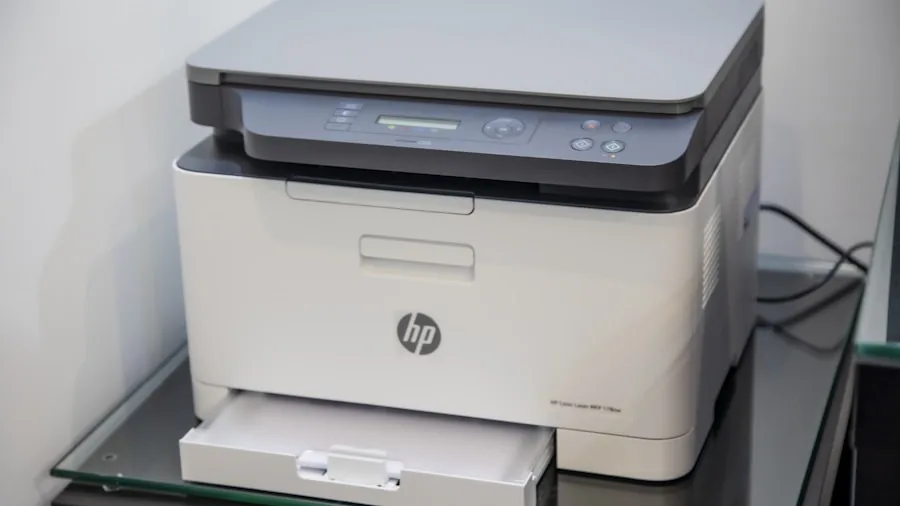 Person using smartphone to wirelessly print documents from a home office desk setup