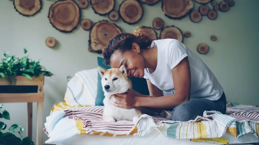 Pet owner in living room with dog, demonstrating need for air purification in homes with pets