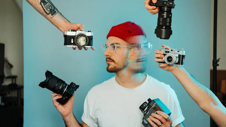 Photographer examining camera sensors and specifications while planning a shoot