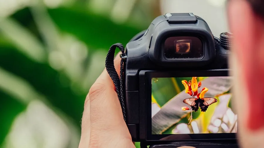 Photographer with camera in hands during outdoor shoot, demonstrating proper grip and handling technique