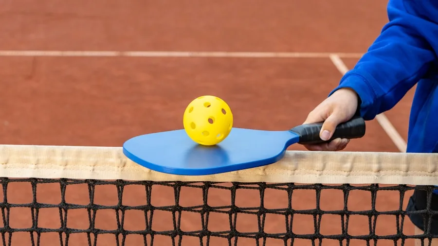 Recreational player practicing pickleball fundamentals on outdoor court during golden hour